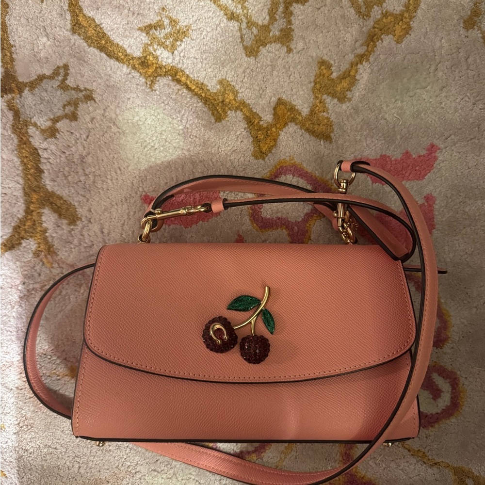 Coach Pink Crossbody Bag with Cherry Detail